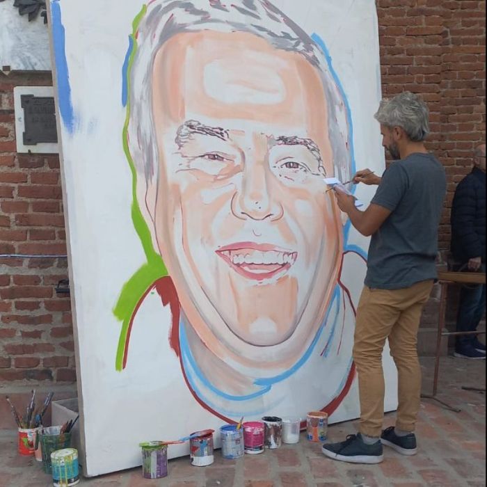 Reducción le rinde homenaje al Padre Pugnata con un mural pintado por peregrinos 